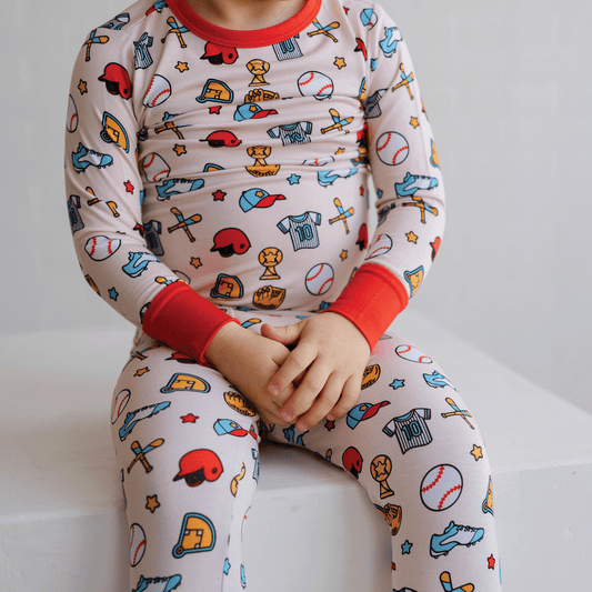 Baseball-themed pajamas for toddler to youth sizes, made with soft bamboo fabric for a cozy and comfortable sleep.