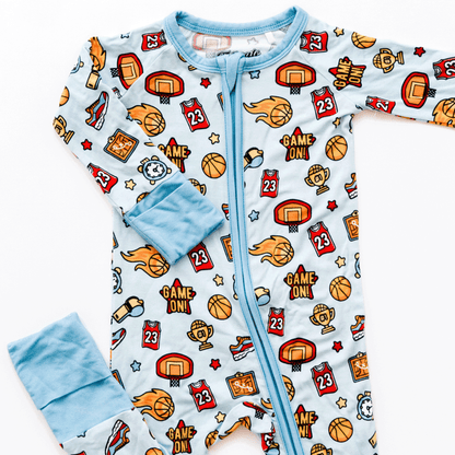 Basketball-themed baby one-piece with soft bamboo fabric, double zippers for easy changes, and a sporty design for little fans.