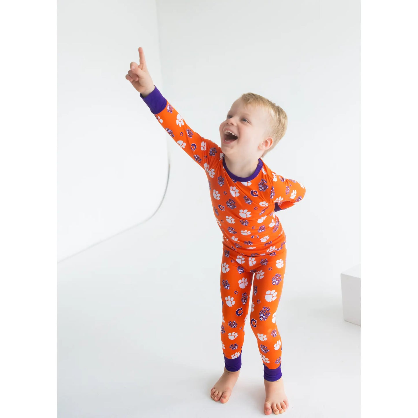 Clemson Tigers Two-Piece Pajama Se With Long Sleeves And Pants and paw mark print.
