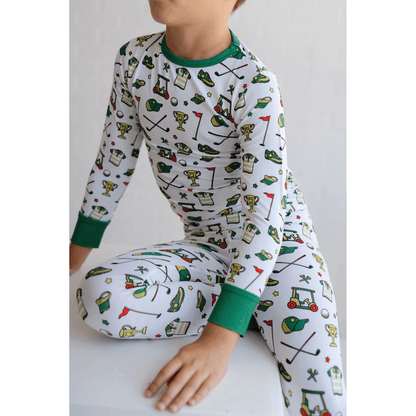 Golf-themed pajamas for toddler to youth sizes, made with soft bamboo fabric for a cozy and comfortable sleep.