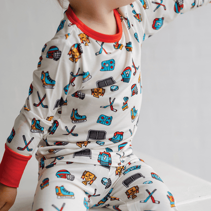 Hockey-themed pajamas for toddler to youth sizes, made with soft bamboo fabric for a cozy and comfortable sleep.