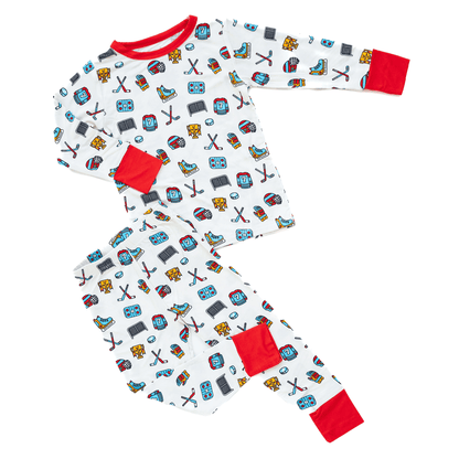 Hockey-themed pajamas for toddler to youth sizes, made with soft bamboo fabric for a cozy and comfortable sleep.