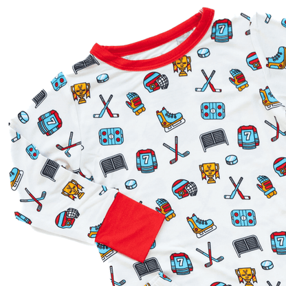 Hockey-themed pajamas for toddler to youth sizes, made with soft bamboo fabric for a cozy and comfortable sleep.