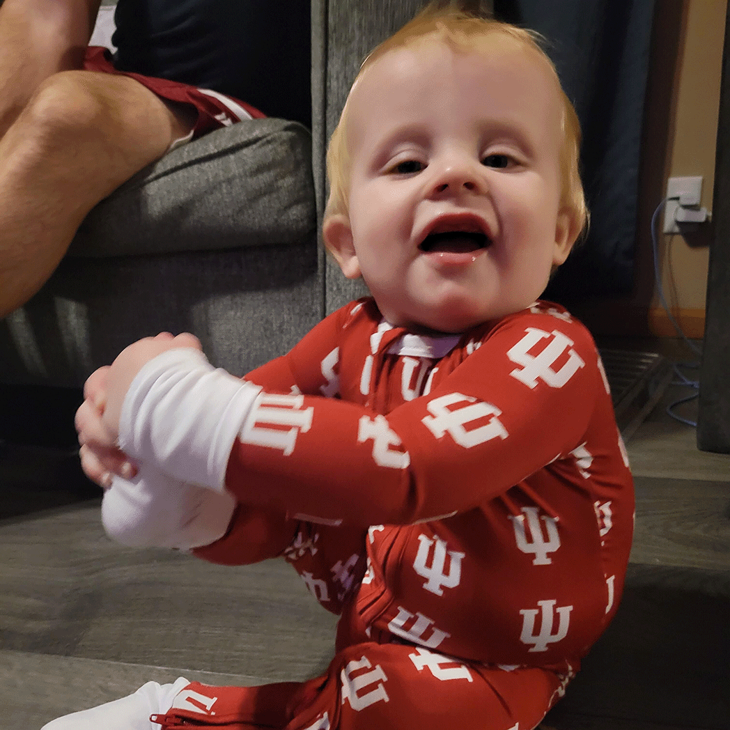 Indiana Hoosiers one-piece bamboo sleeper for baby to toddler with official team logo, soft bamboo fabric, and a snug fit. 