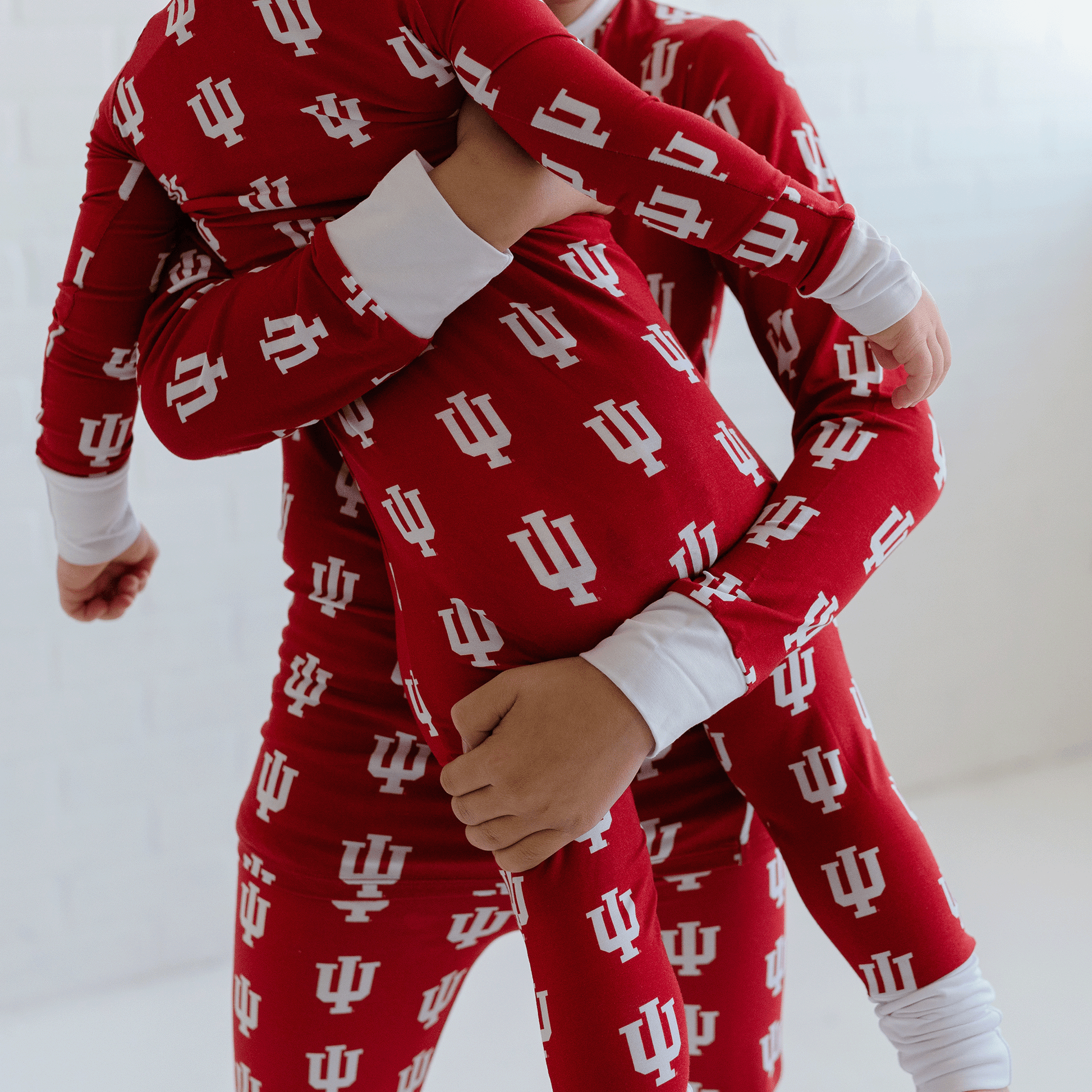 Indiana Hoosiers baby one-piece with official team logo, soft bamboo fabric, and double zippers for easy diaper changes.