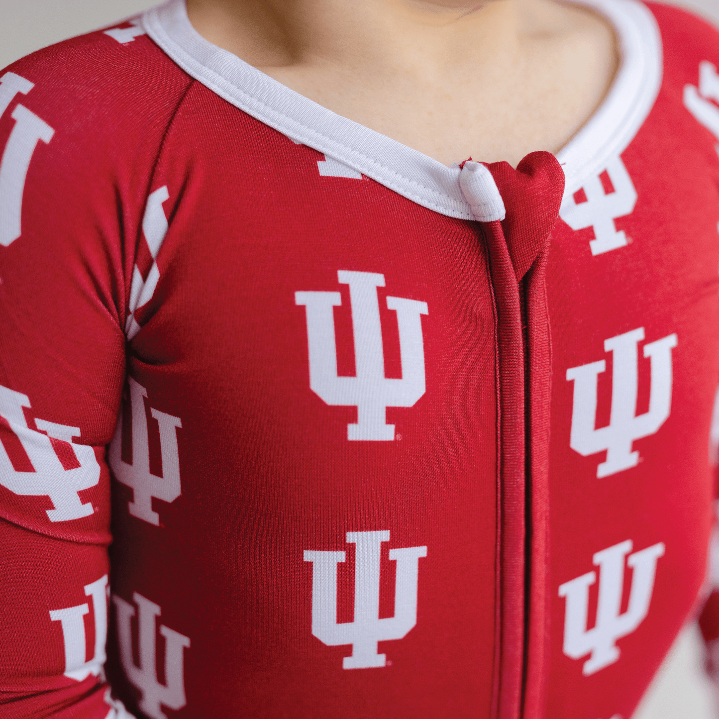 Indiana Hoosiers baby one-piece with official team logo, soft bamboo fabric, and double zippers for easy diaper changes.