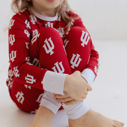 Indiana Hoosiers pajamas for toddler to youth with official team logo, soft bamboo fabric, and a snug fit.