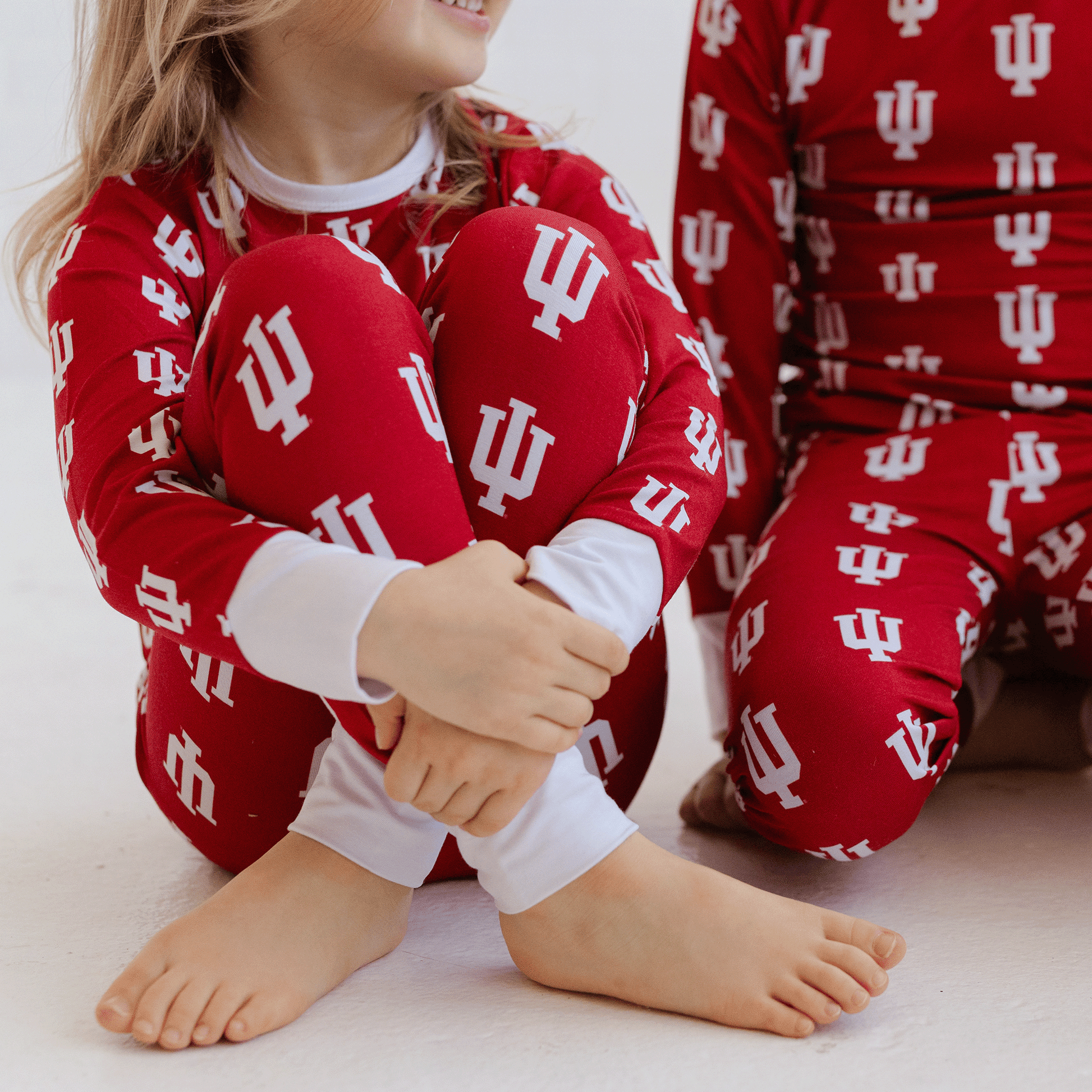 Indiana Hoosiers pajamas for toddler to youth with official team logo, soft bamboo fabric, and a snug fit.