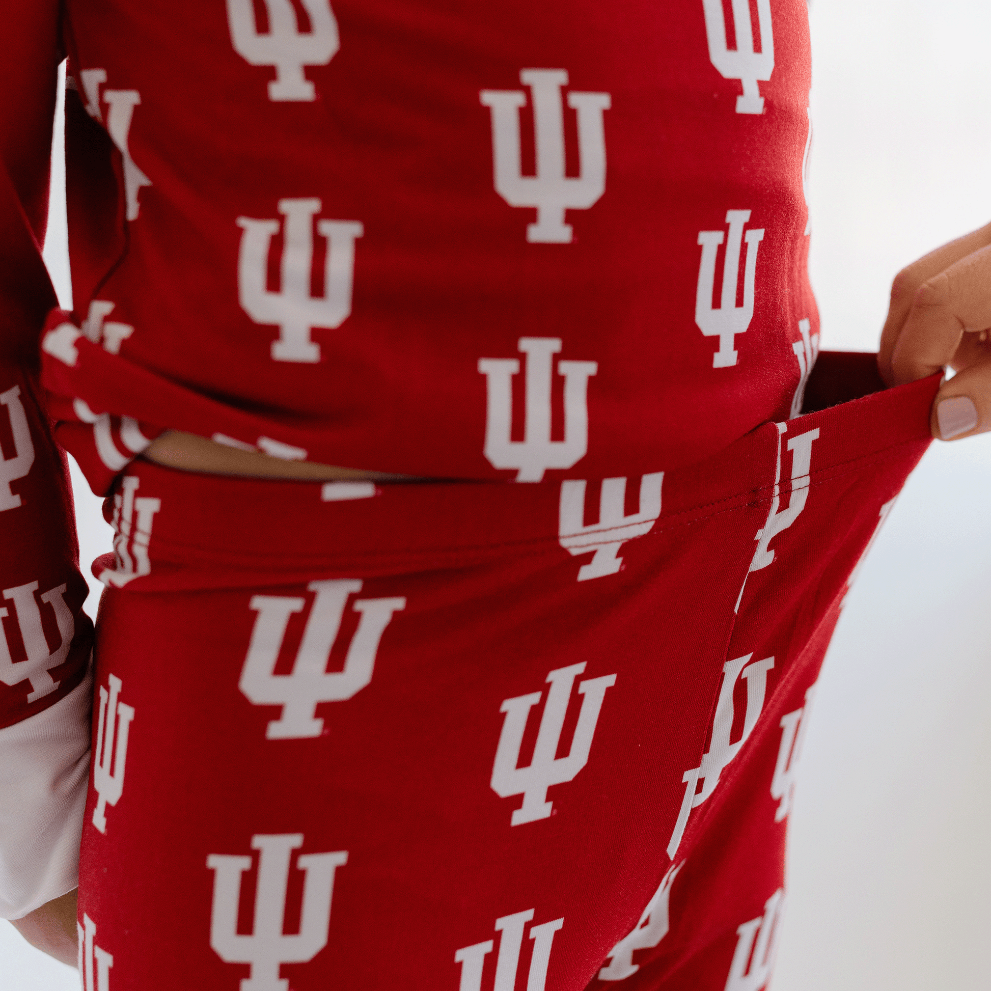 Indiana Hoosiers pajamas for toddler to youth with official team logo, soft bamboo fabric, and a snug fit.