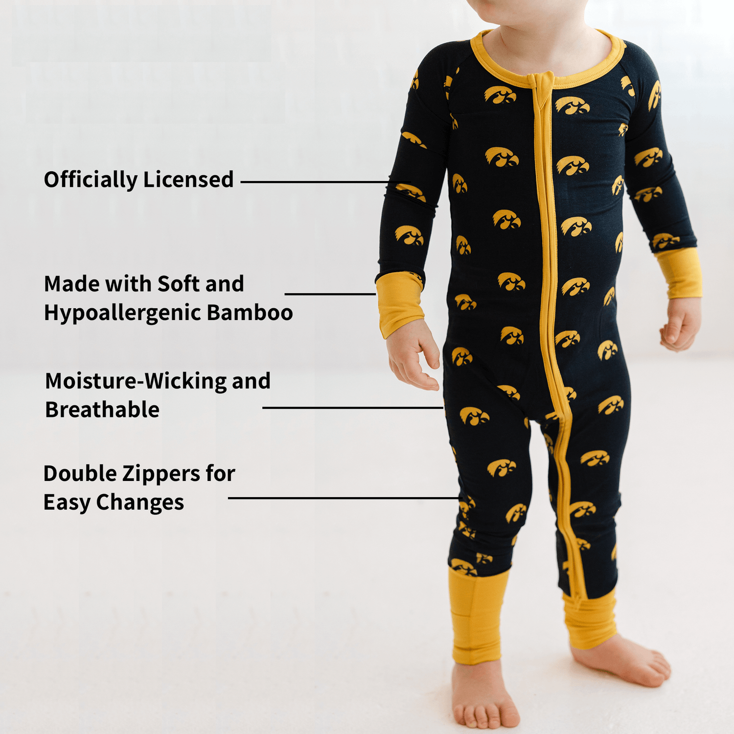 Iowa Hawkeyes one-piece with official team logo, soft bamboo fabric, and double zippers for easy diaper changes.