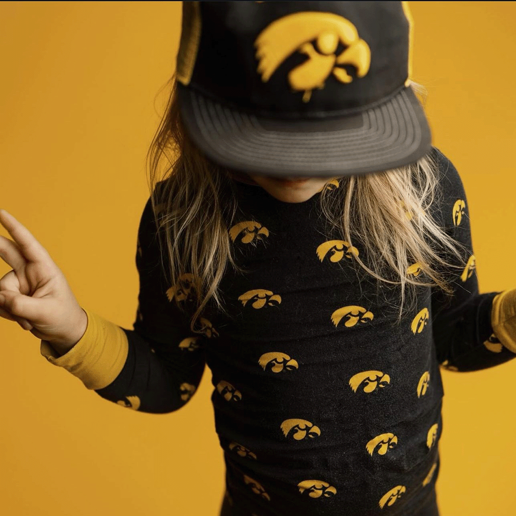 Iowa Hawkeyes officially licensed two-piece pajama set for toddlers and kids. Made from soft bamboo fabric with Hawkeyes logo, perfect for comfortable sleep and showing team pride.