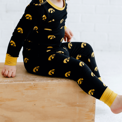 Iowa Hawkeyes pajamas for toddler to youth with official team logo, soft bamboo fabric, and a snug fit.