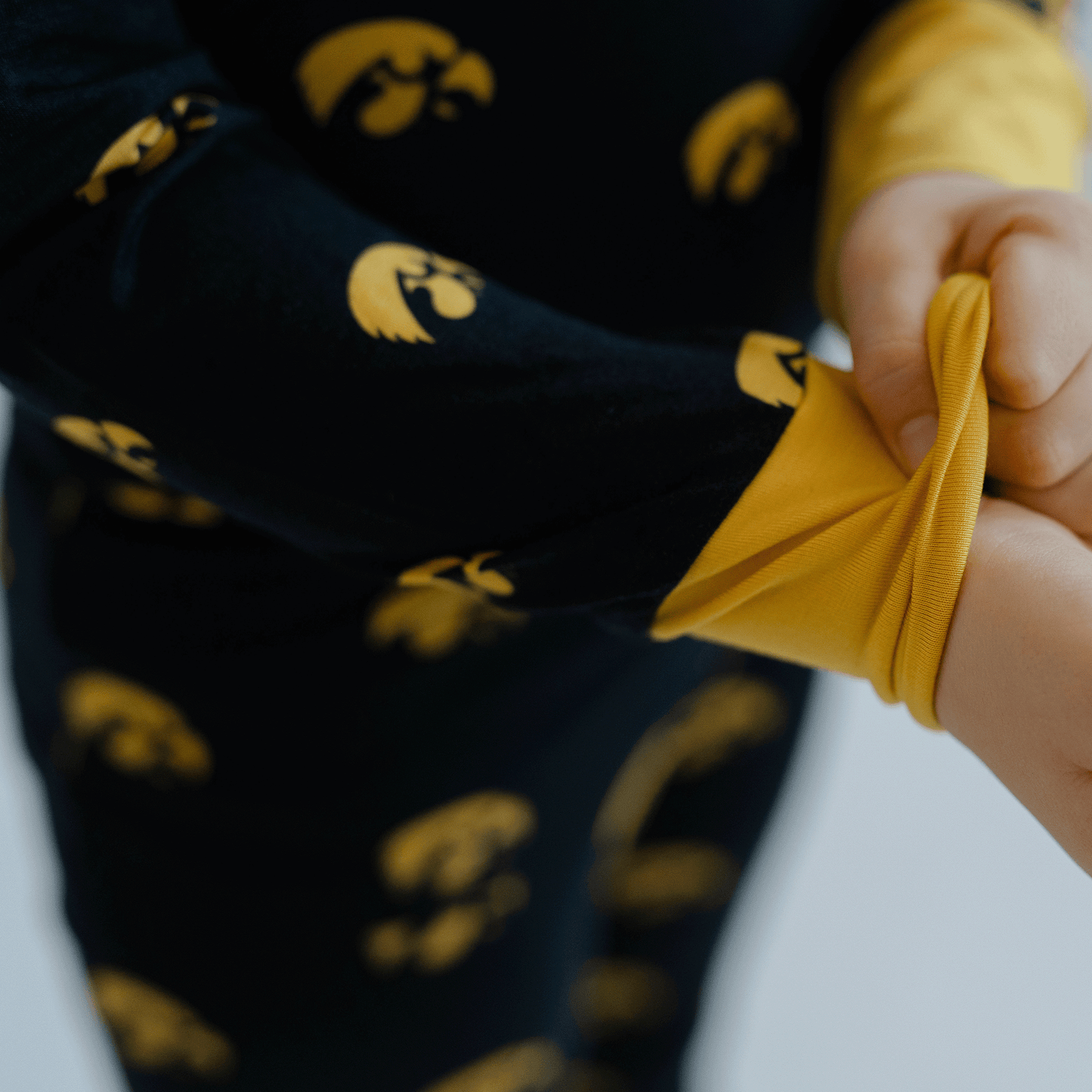 Iowa Hawkeyes pajamas for toddler to youth with official team logo, soft bamboo fabric, and a snug fit.