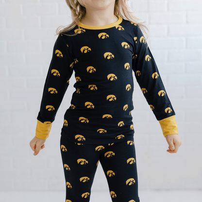 Iowa Hawkeyes pajamas for toddler to youth with official team logo, soft bamboo fabric, and a snug fit.