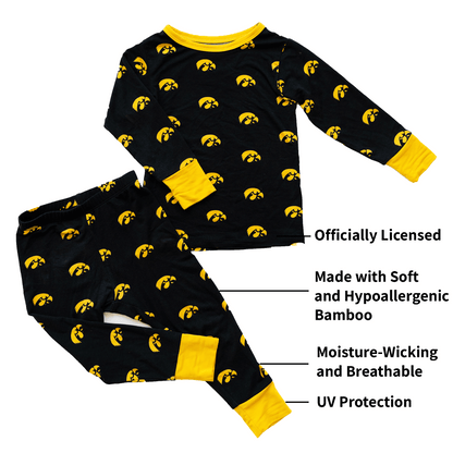 Iowa Hawkeyes pajamas for toddler to youth with official team logo, soft bamboo fabric, and a snug fit.