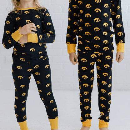 Iowa Hawkeyes pajamas for toddler to youth with official team logo, soft bamboo fabric, and a snug fit.