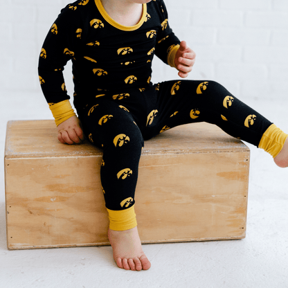 Iowa Hawkeyes pajamas for toddler to youth with official team logo, soft bamboo fabric, and a snug fit.