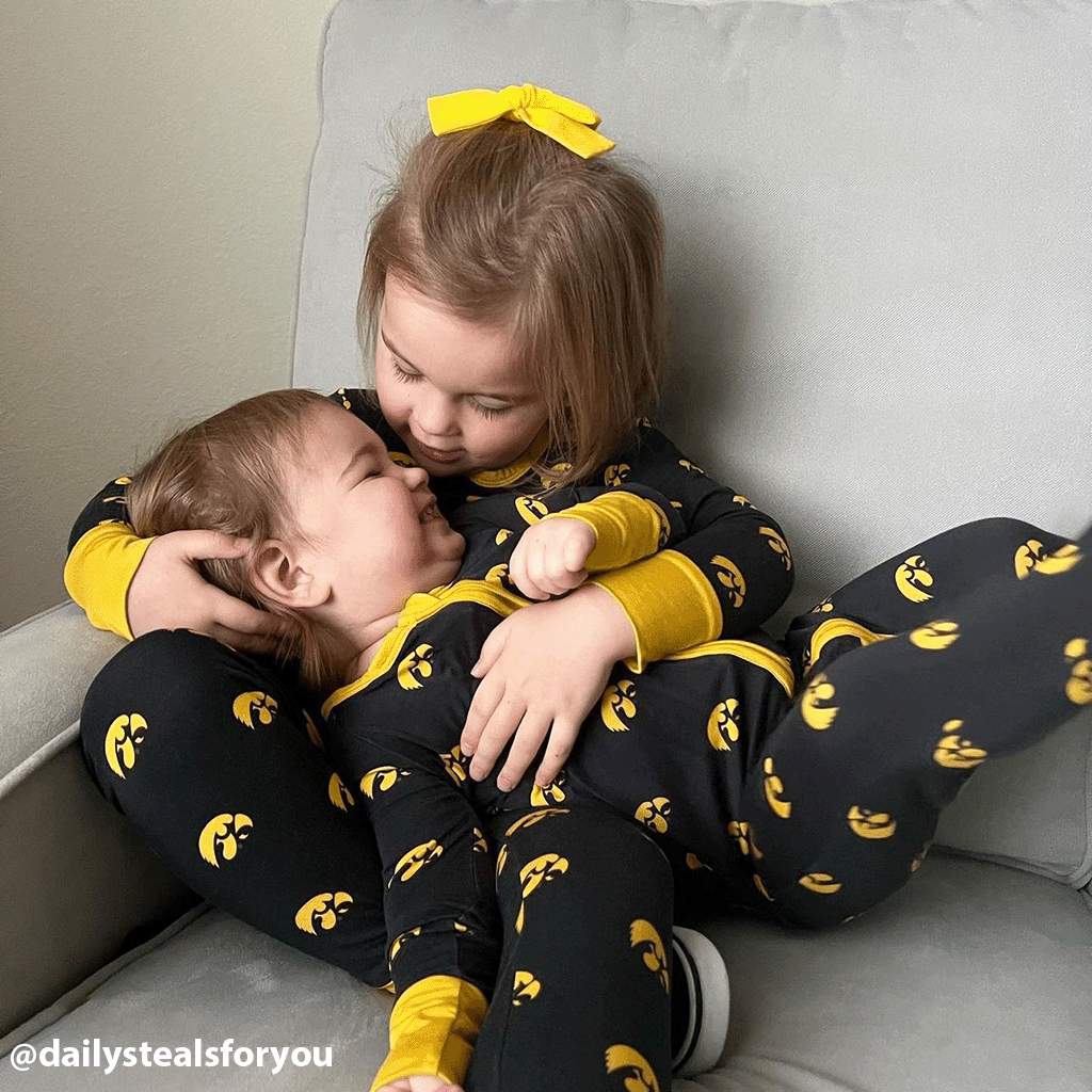 Iowa Hawkeyes officially licensed two-piece pajama set for toddlers and kids. Made from soft bamboo fabric with Hawkeyes logo, perfect for comfortable sleep and showing team pride.