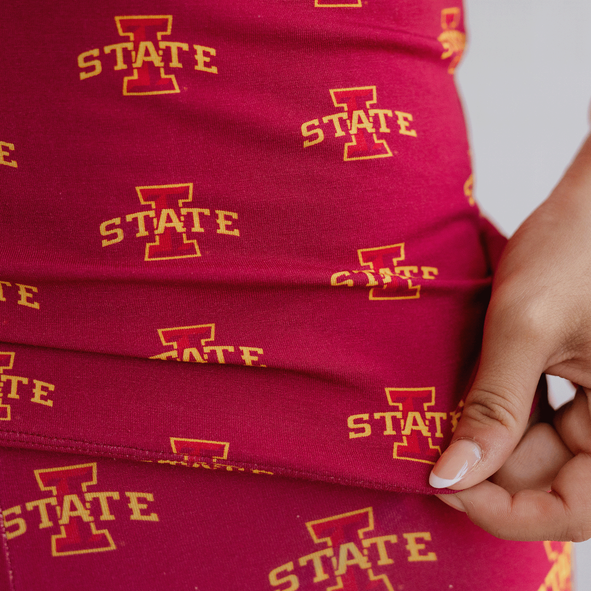 Iowa State Cyclones pajamas for toddler to youth with official team logo, soft bamboo fabric, and a snug fit.