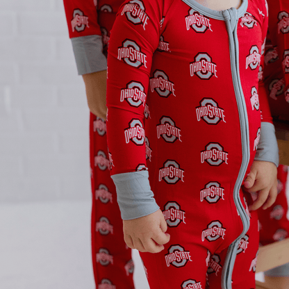 Ohio State Buckeyes one-piece with official team logo, soft bamboo fabric, and double zippers for easy changes.