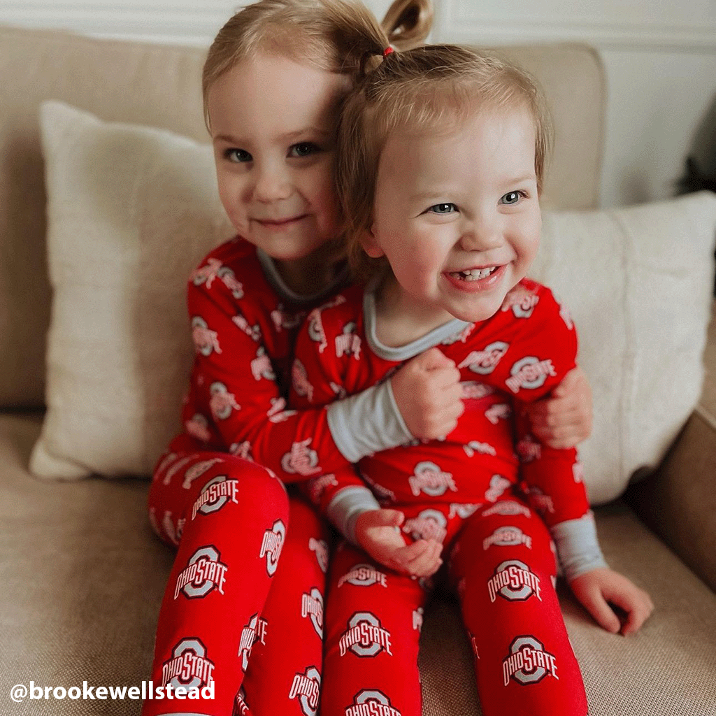 Ohio State Buckeyes officially licensed two-piece pajama set for toddlers and kids. Made from soft bamboo fabric with Buckeyes logo, offering comfort and school spirit for young fans.