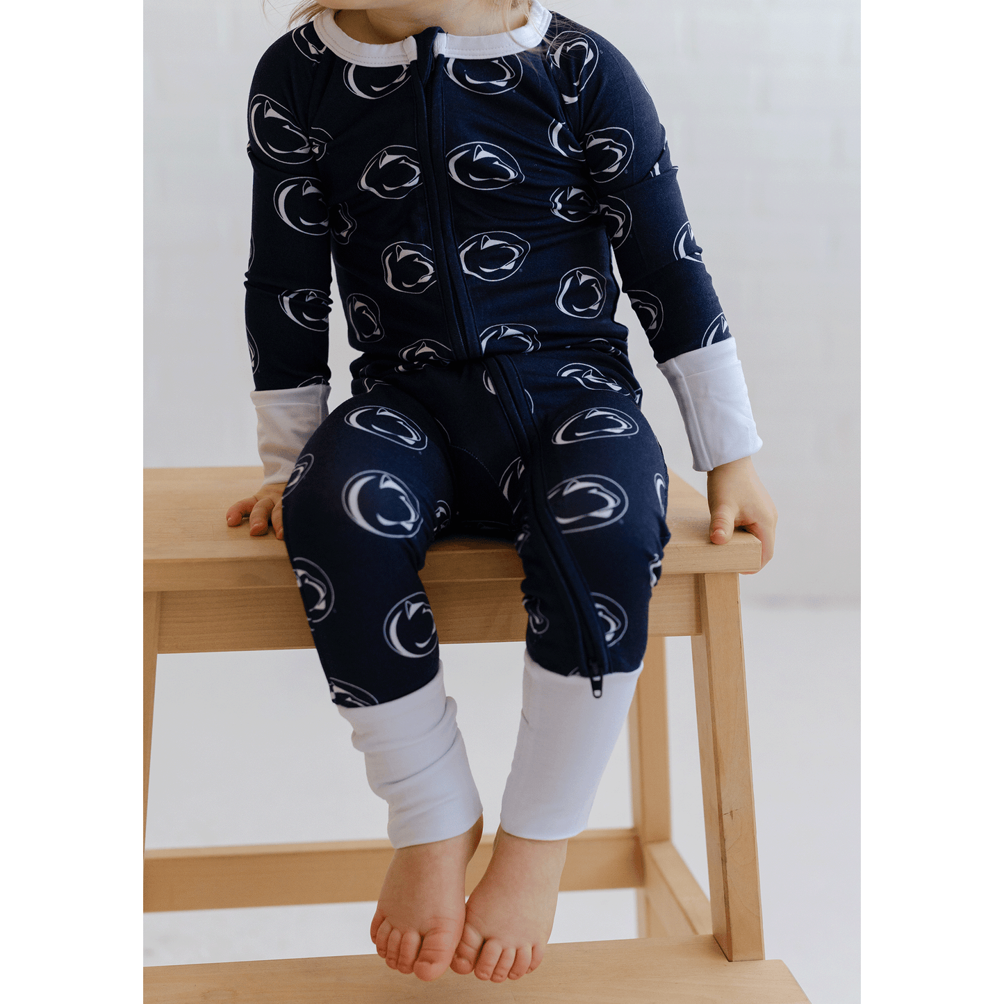 Penn State Nittany Lions baby one-piece with official team logo, soft bamboo fabric, and double zippers for easy diaper changes.