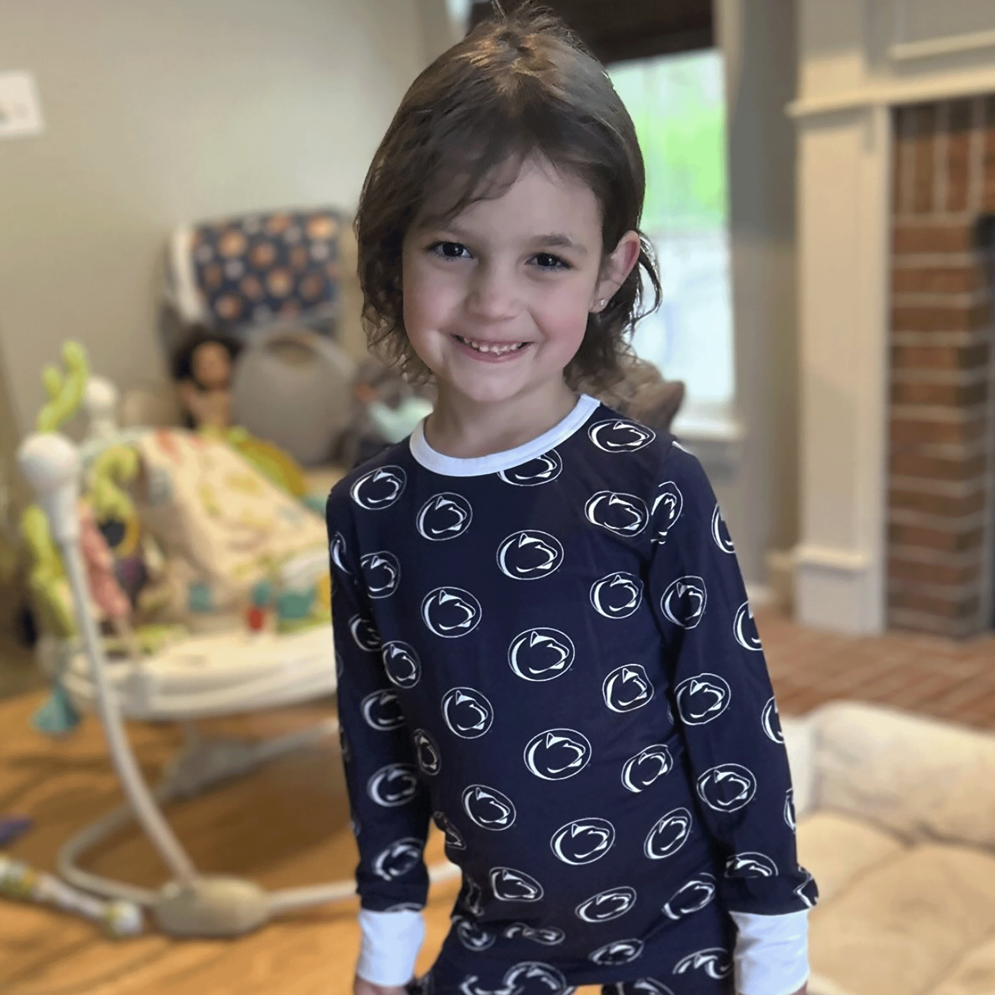 Penn State Nittany Lions officially licensed two-piece pajama set for toddlers and kids. Made from soft bamboo fabric with Penn State logo, offering comfort and team pride for young fans.