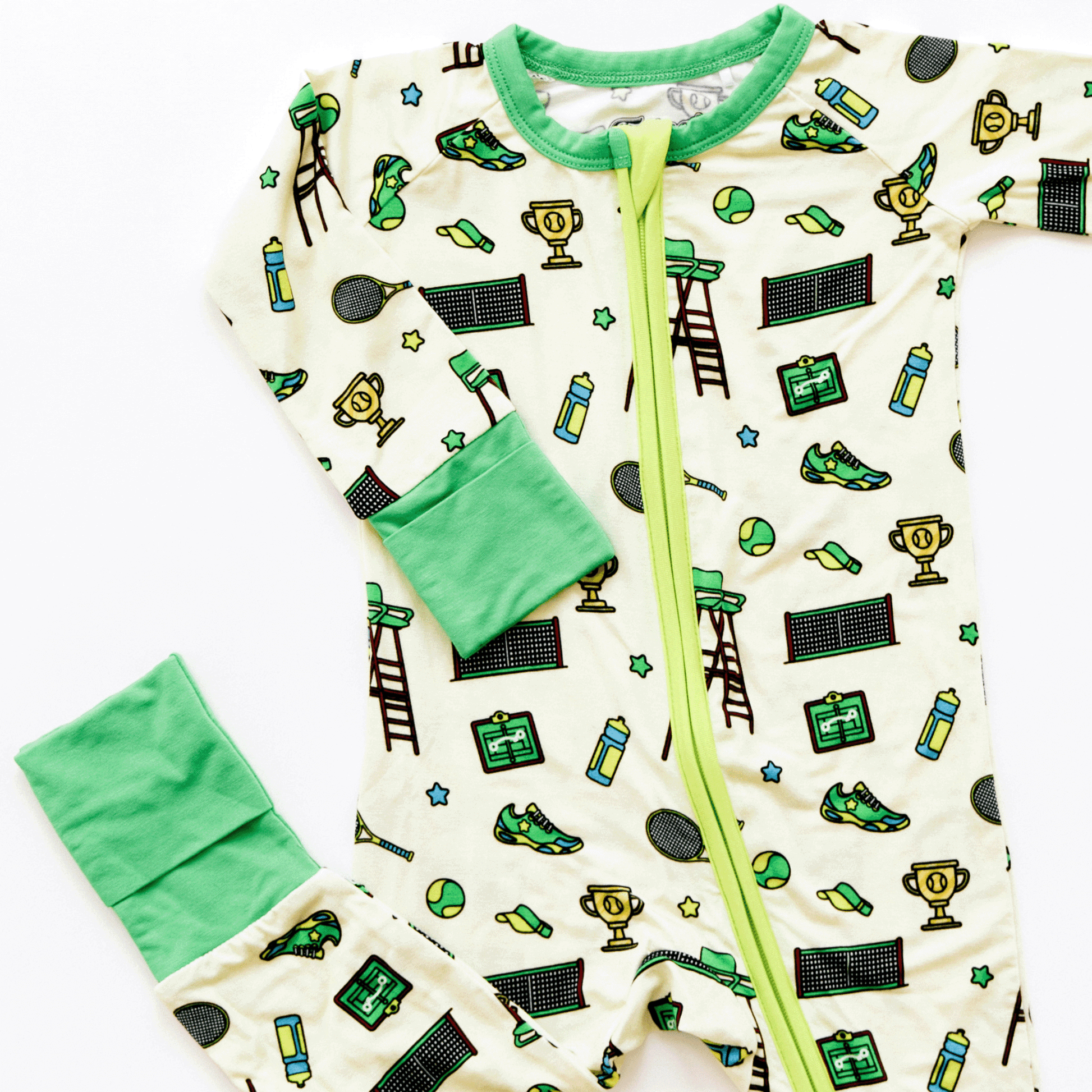 Tennis-themed baby one-piece with soft bamboo fabric, double zippers for easy changes, and a sporty design for little tennis fans.