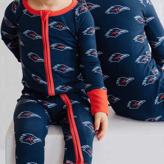 UTSA Roadrunners baby one-piece with official team logo, soft bamboo fabric, and double zippers for easy diaper changes.