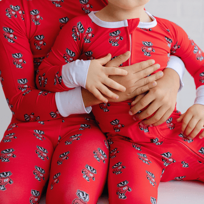 Wisconsin Badgers baby one-piece with official team logo, soft bamboo fabric, and double zippers for easy diaper changes.