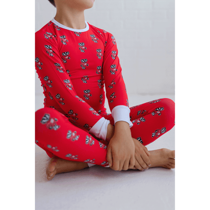 Wisconsin Badgers toddler to youth pajamas with official team logo, soft bamboo fabric, and a cozy fit for comfortable sleep.