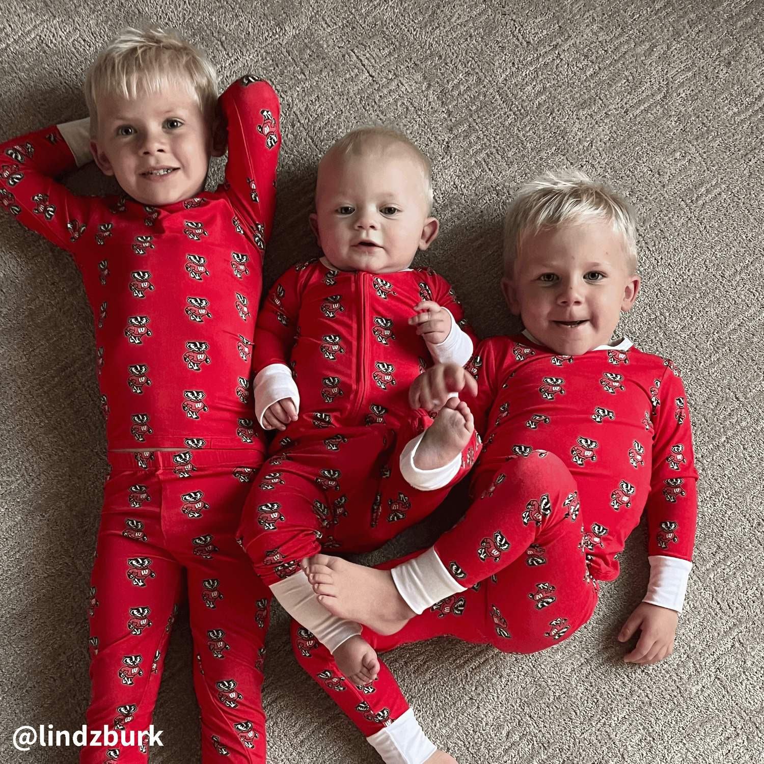 Wisconsin Badgers officially licensed two-piece pajama sets and one-piece sleepers for infants and toddlers. Made from soft bamboo fabric with Badgers logo, featuring cozy fit and easy-change designs.