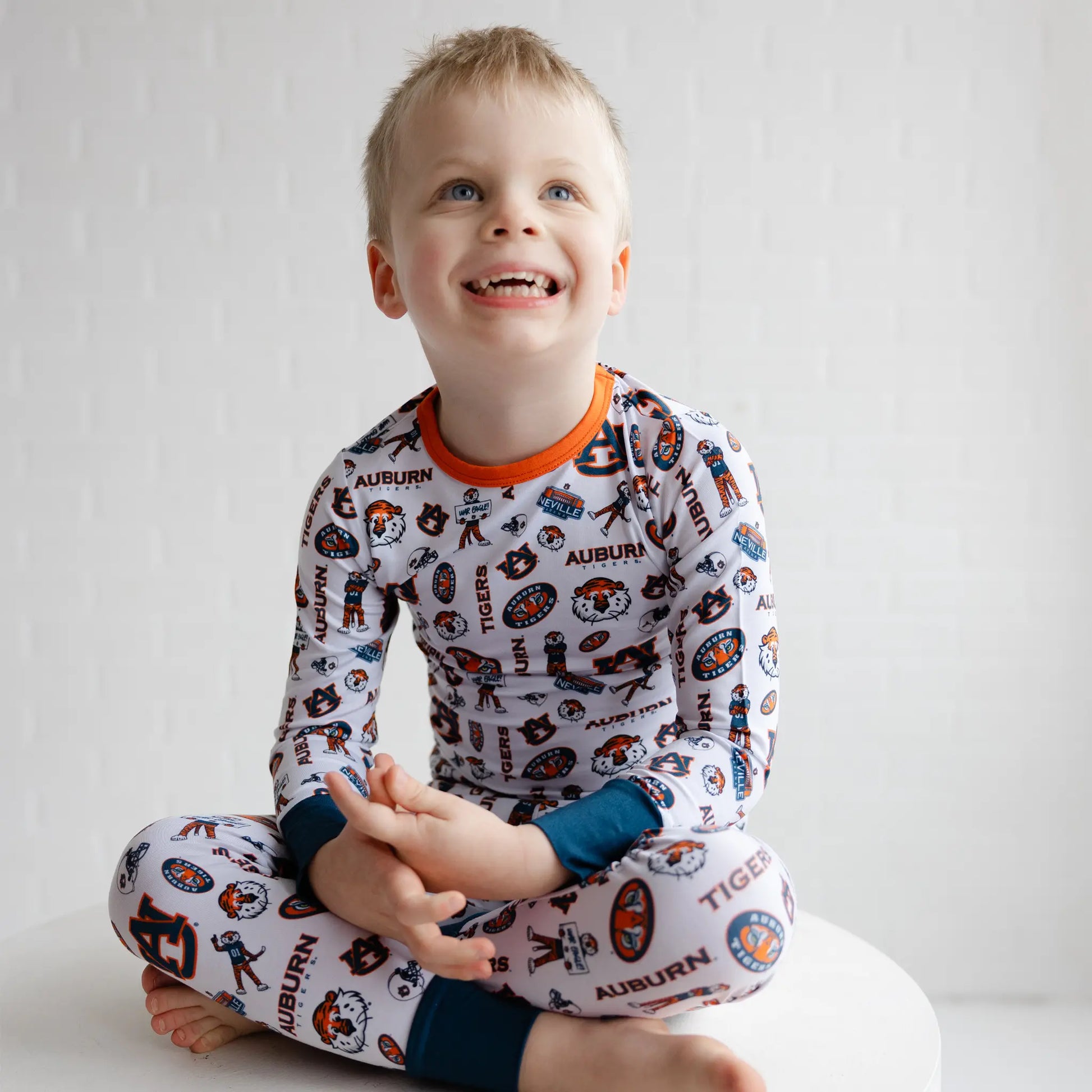 Auburn Tigers two-piece pajamas for baby, toddler, and youth fans cheering on the Tigers.