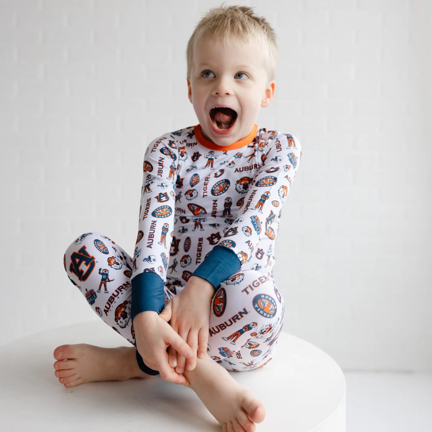 Auburn Tigers two-piece pajama set for kids featuring officially licensed team colors and sporty sleepwear style.