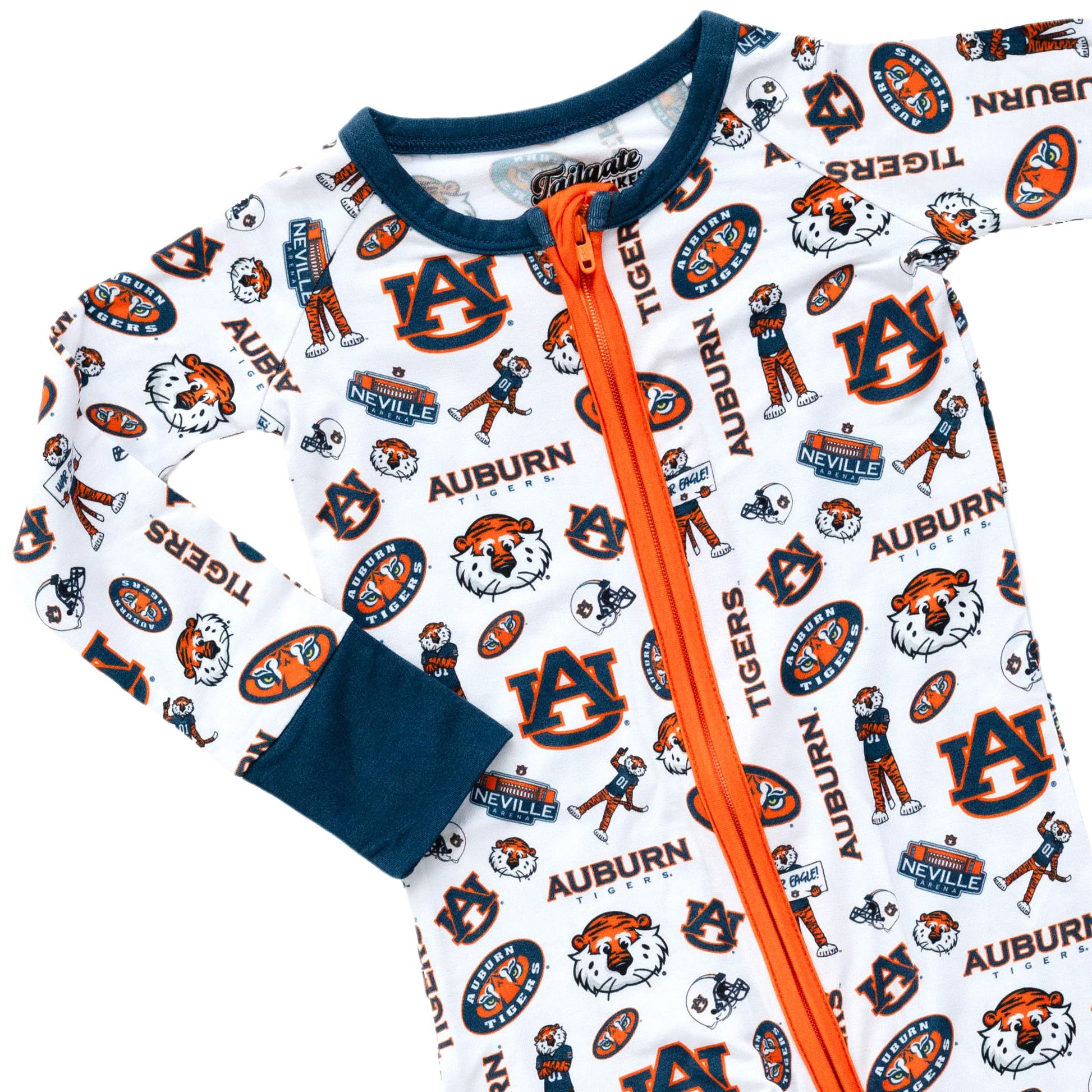 Baby wearing Auburn Tigers zippy sleeper featuring a comfortable long sleeve design
