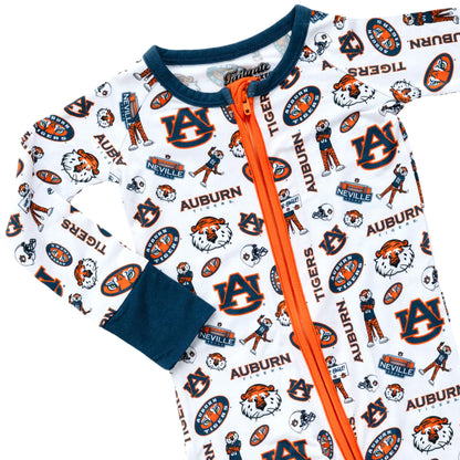 Baby wearing Auburn Tigers zippy sleeper featuring a comfortable long sleeve design