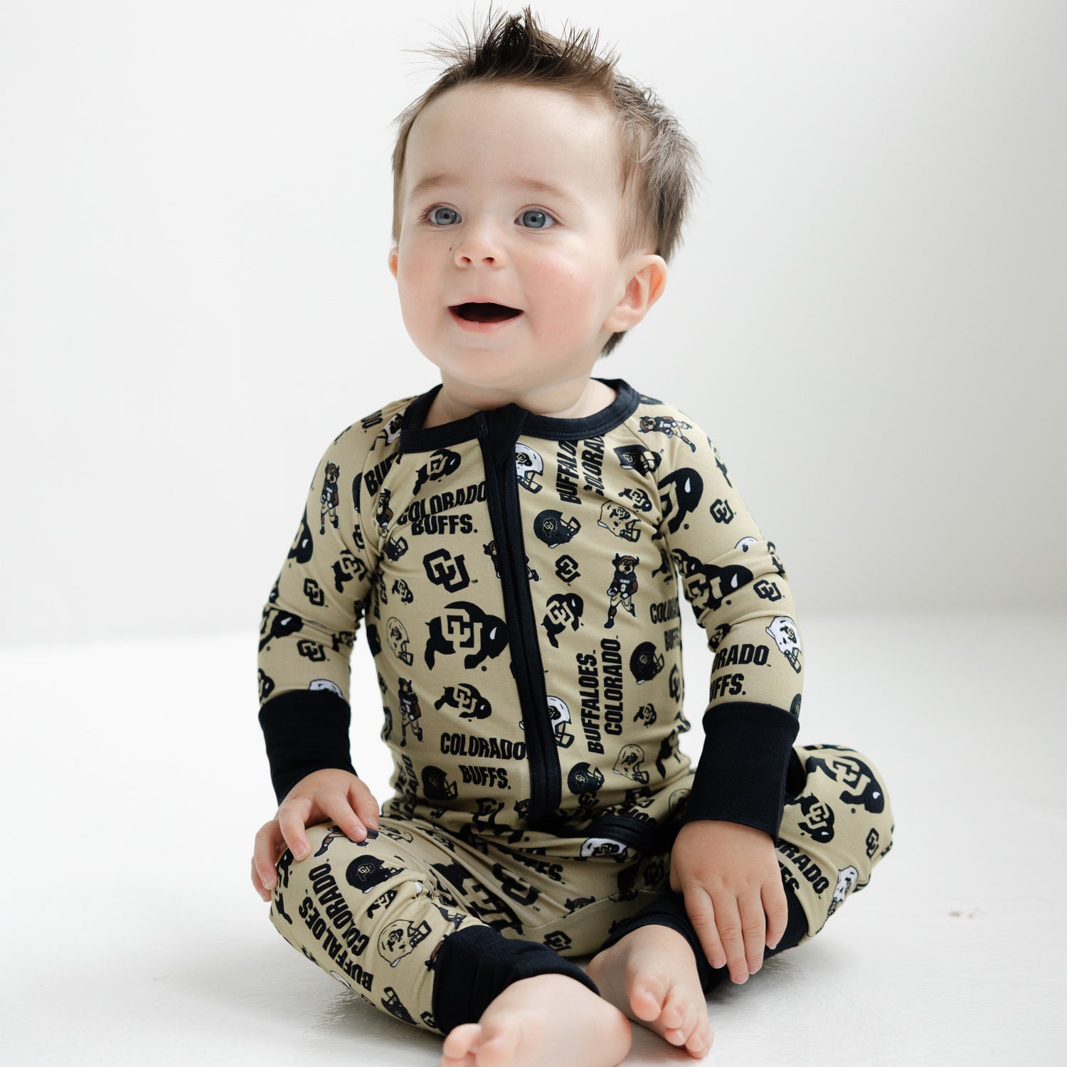 Colorado Buffaloes infant bamboo one-piece sleeper featuring all-over multi-logo Buffs pattern