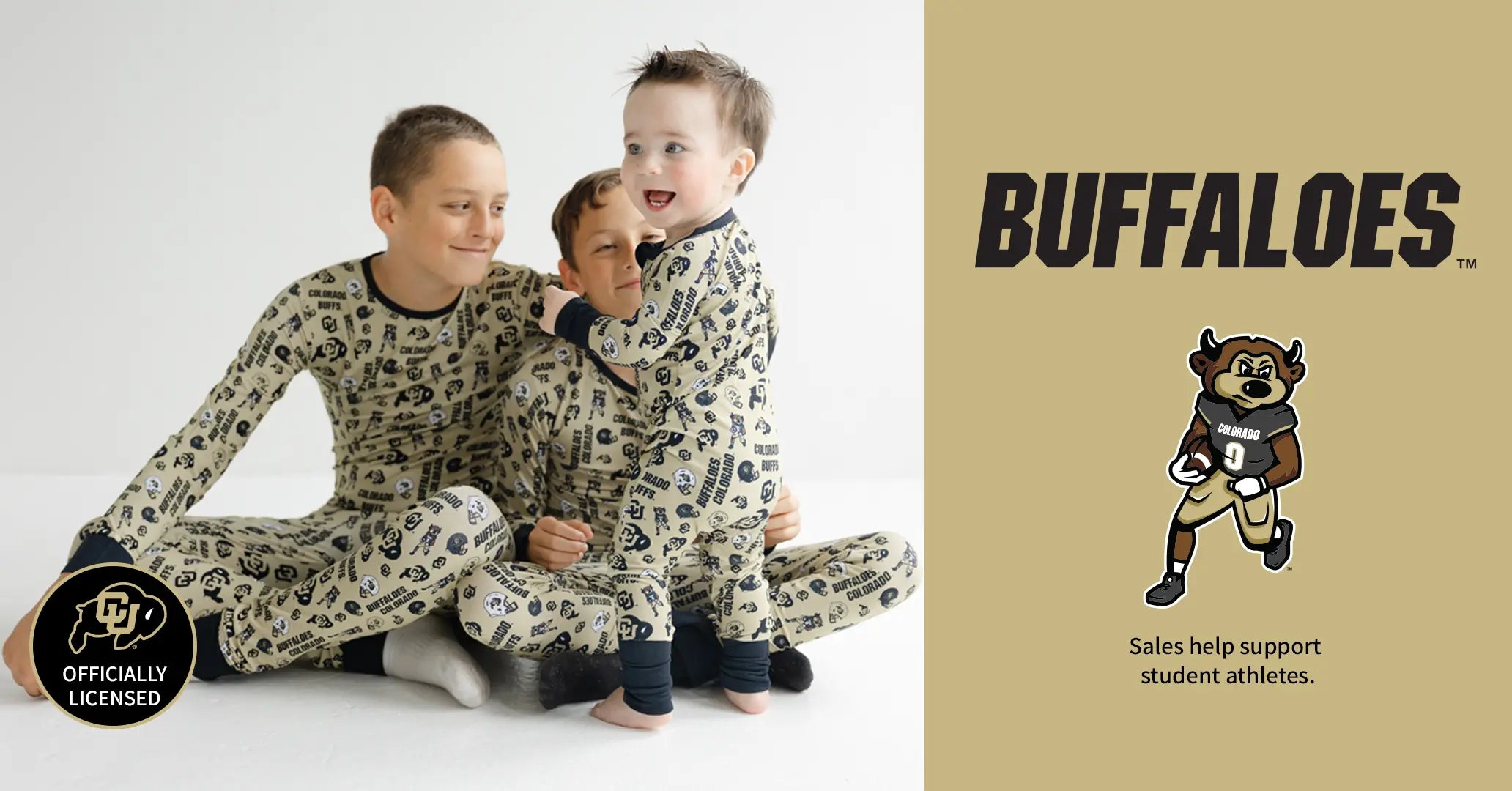 Two children wearing matching pajamas with a 'BUFFALOES' logo and buffaloes mascot on a beige background.