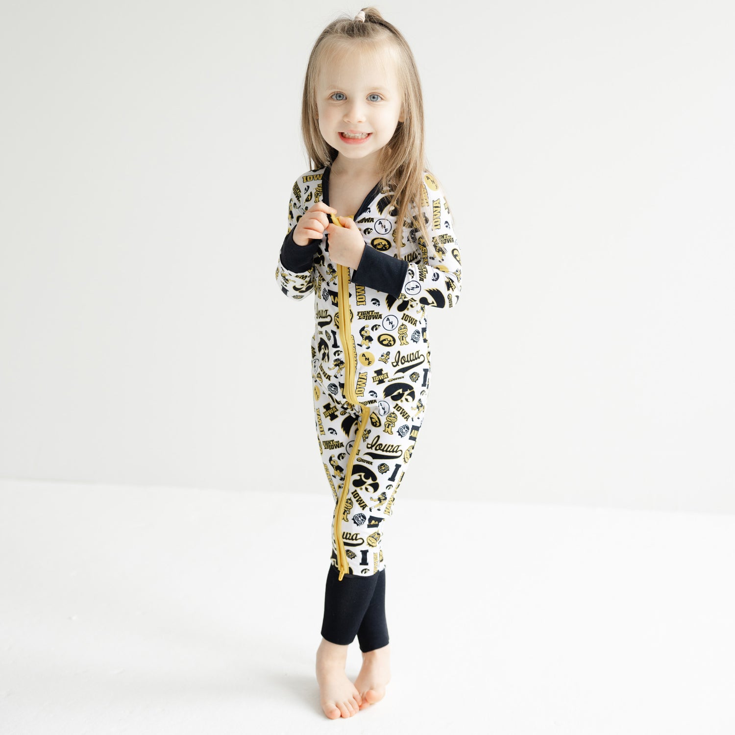 Iowa Hawkeyes bamboo zippy pajamas for babies with all-over team branding
