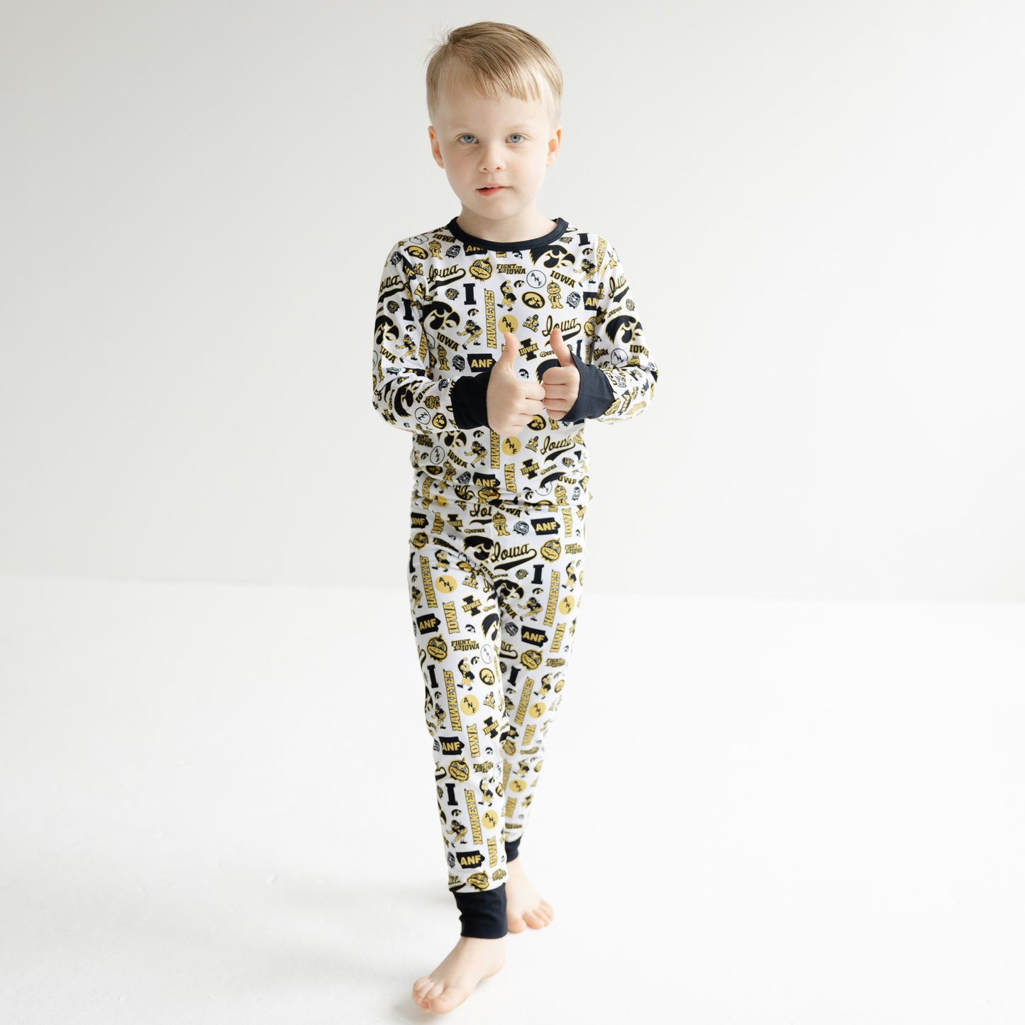 Officially licensed Iowa Hawkeyes kids sleepwear with all-over Hawkeyes branding