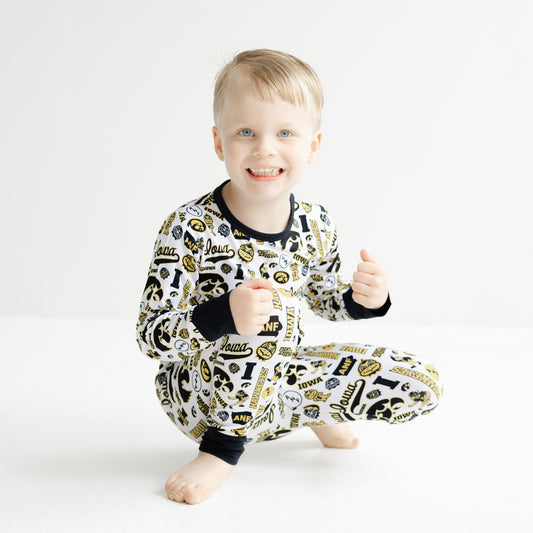 Iowa Hawkeyes kids bamboo two-piece pajama set with white all-over team print