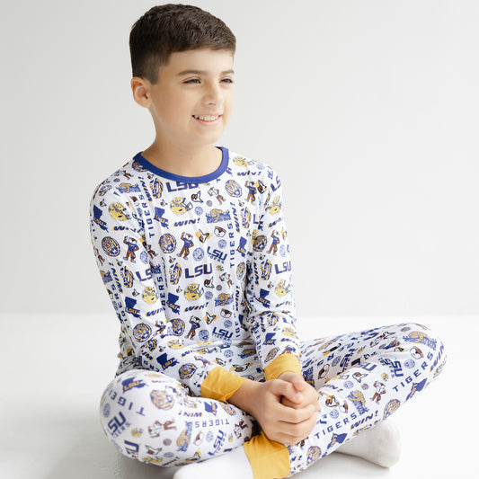 LSU Tigers toddler pajamas with white background purple trim and gold details