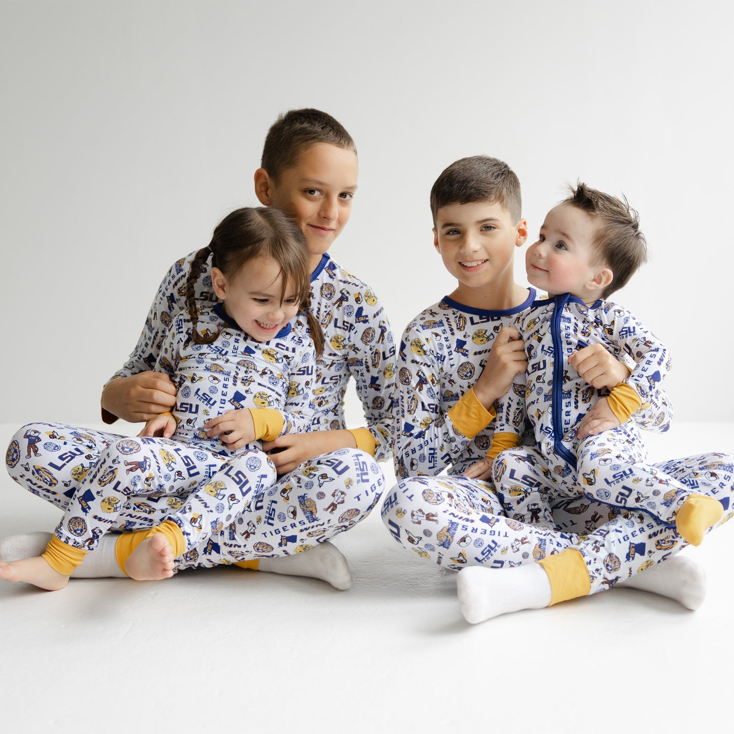 Kids LSU Tigers sleepwear set featuring allover collegiate logo pattern