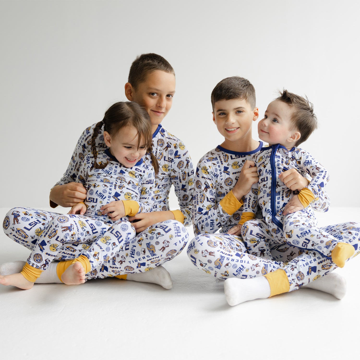 Kids LSU Tigers sleepwear set featuring allover collegiate logo pattern
