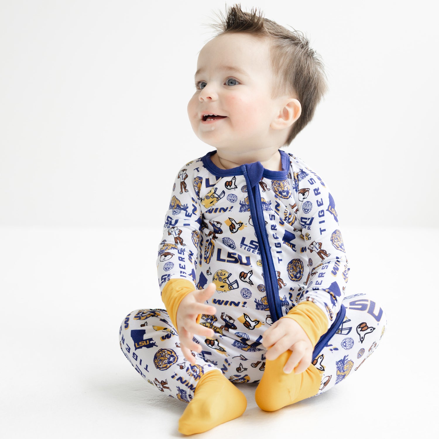 LSU Tigers baby zipper sleeper with allover logo pattern on white background