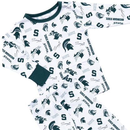 White Michigan State Spartans bamboo pajamas for babies and kids with green trim.