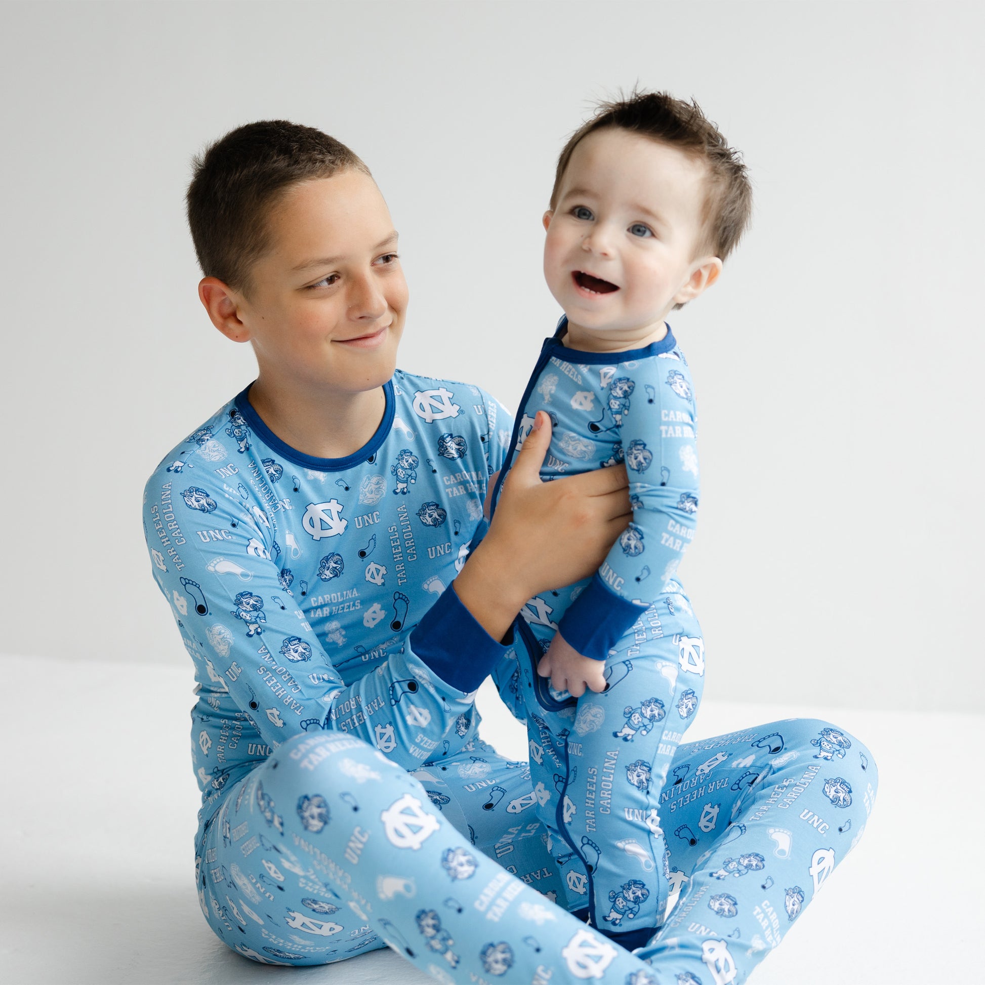 North Carolina Tar Heels kids pajama set with all-over collegiate logo print