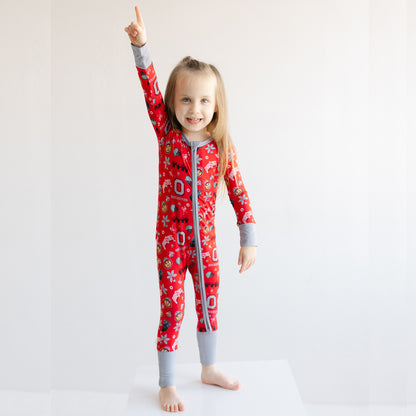 Front view of an Ohio State Buckeyes one-piece sleeper on a toddler