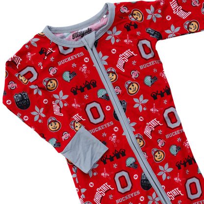A red long-sleeve zip-up baby onesie pajama featuring an all-over Ohio State Buckeyes football print with white, black, and gray details, shown on a plain white background.