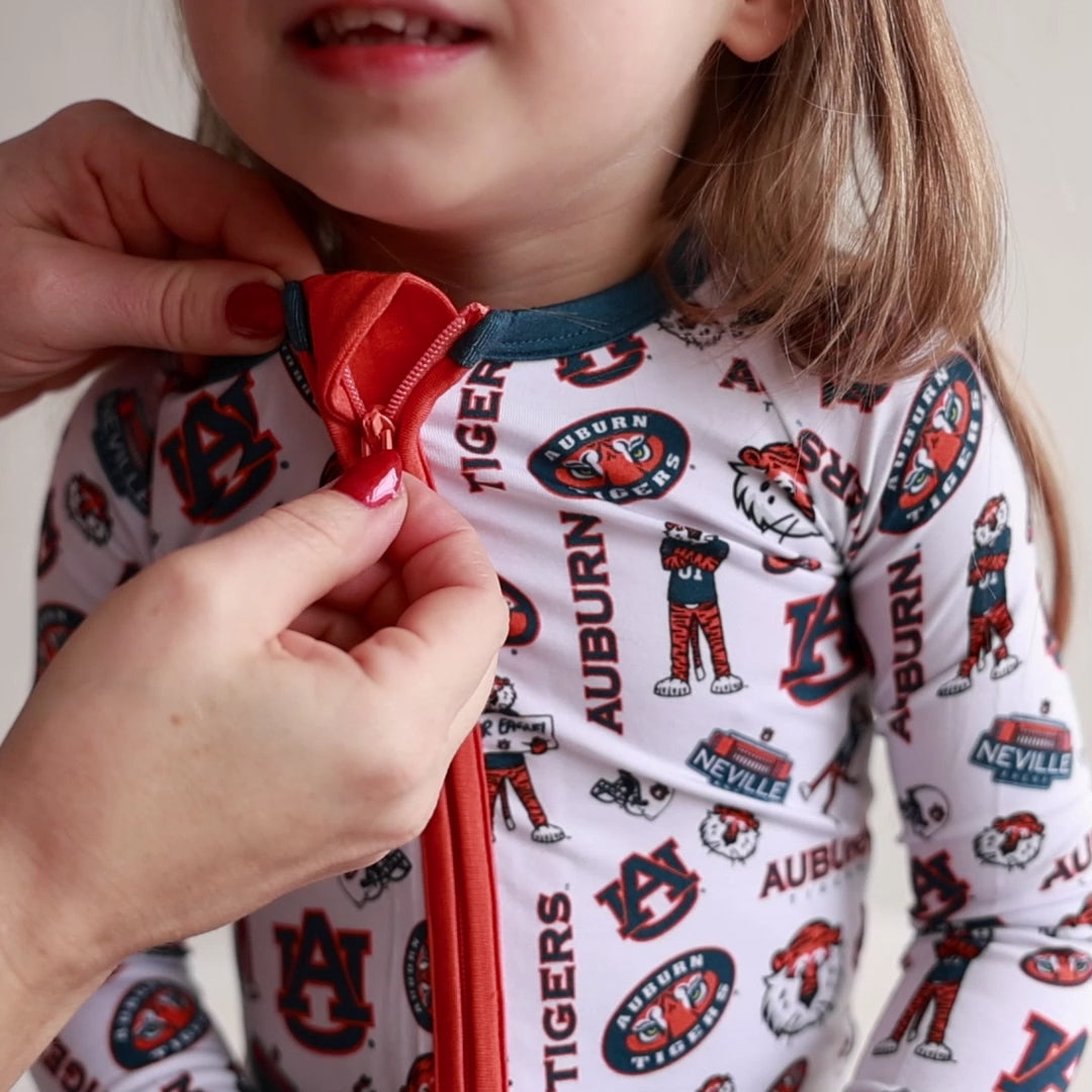 Officially licensed Auburn Tigers bamboo pajamas for babies, toddlers, and kids from Tailgate Tikes.